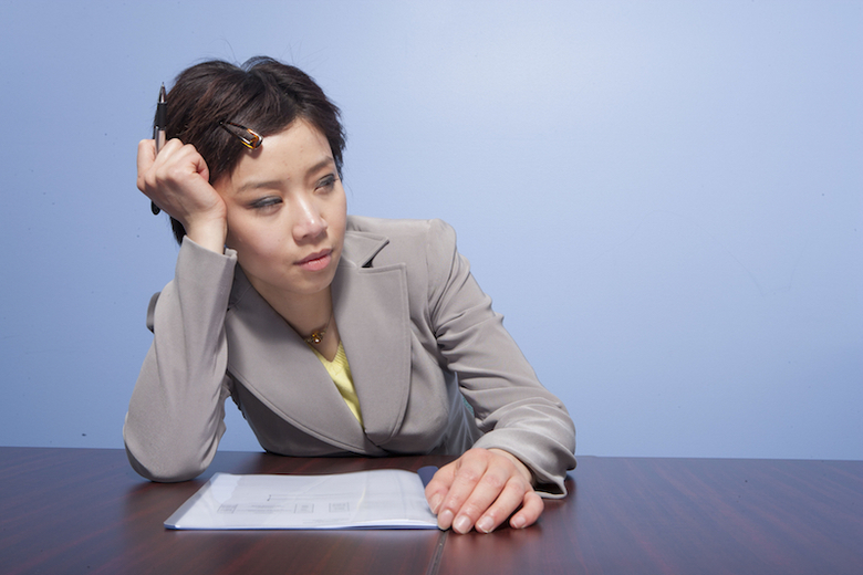 Tired businesswoman in office